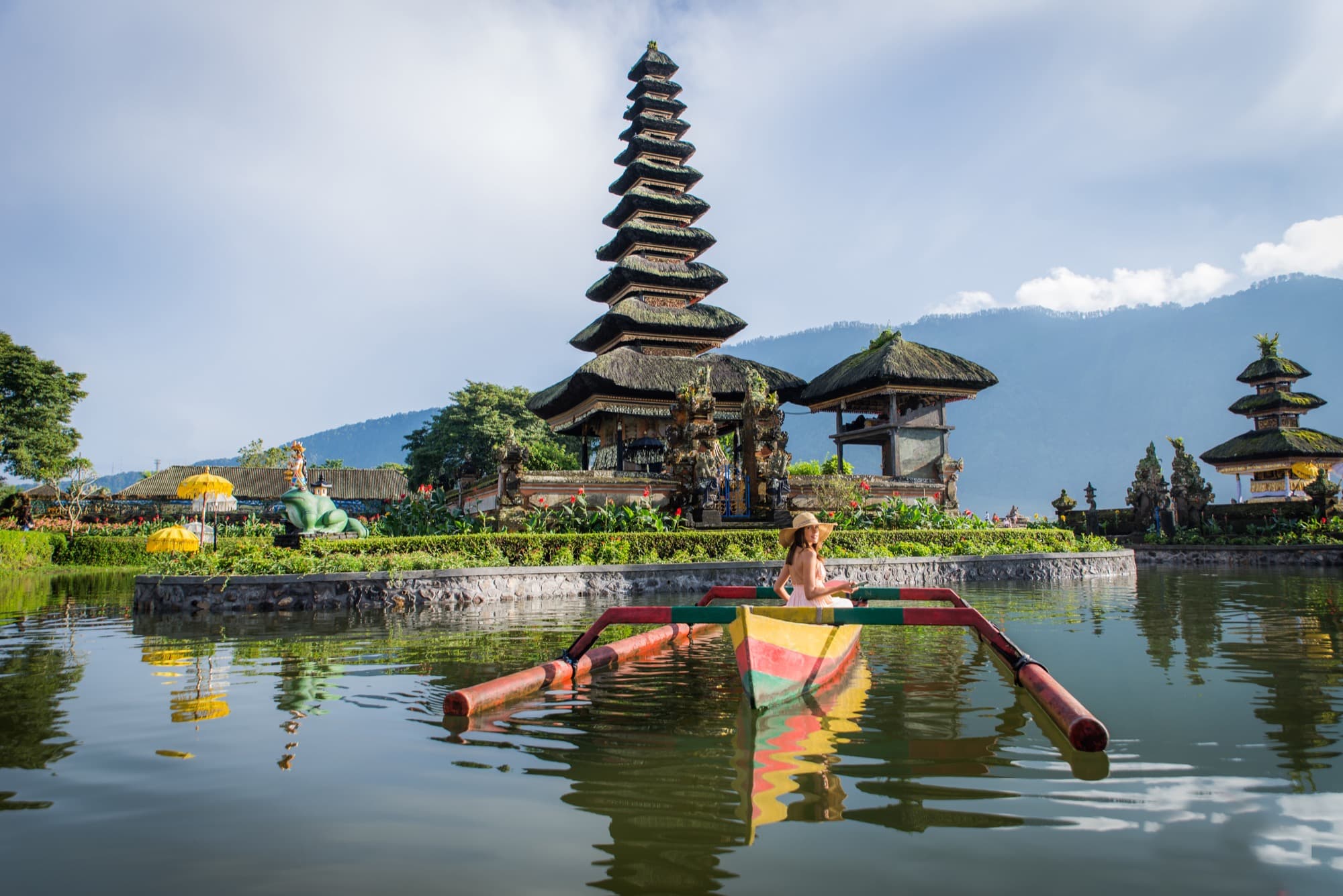 Paddling a boat on a calm Bali lake